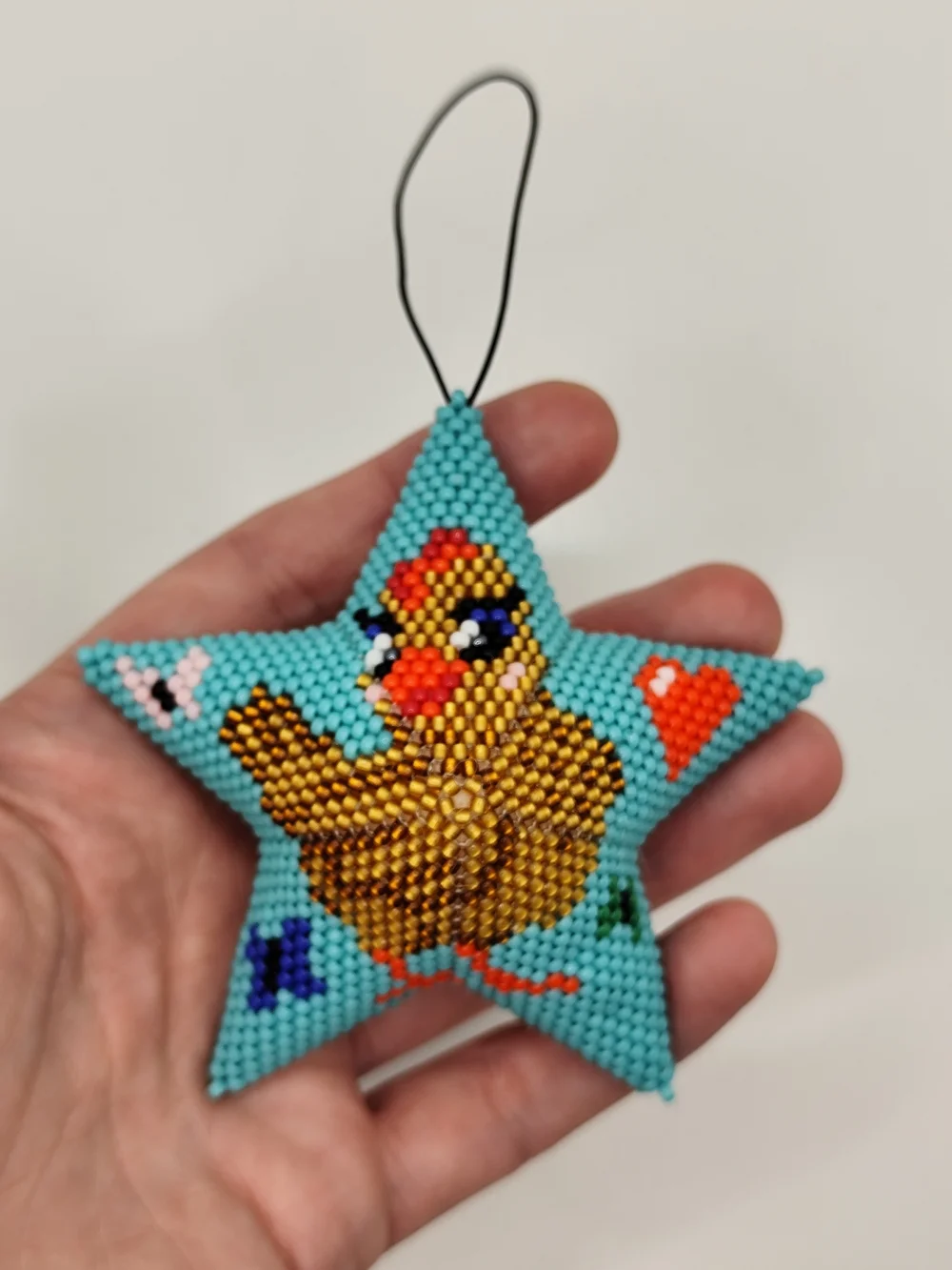 Handmade Turquoise Star Ornament with Beaded Chick Motif